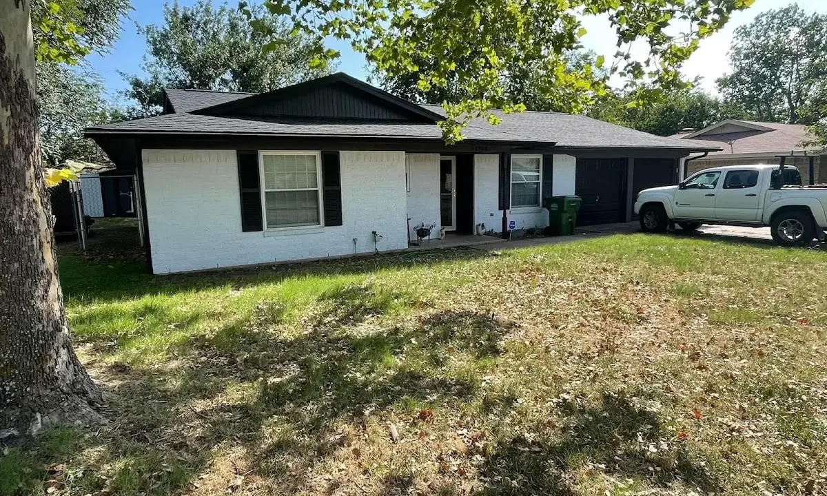 Professional roofing crew working on a residential roof in Ormond Beach